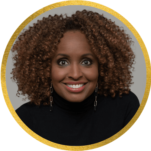 Woman smiling confidently in a professional headshot with gold circular frame